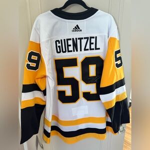 Autographed Jake Guentzel White Penguins Jersey